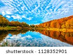 Lake Reflecting Sky In Autumn...