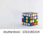 4x4 cube unsolved and scrambled on a plain white background