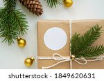 Round white sticker mockup for Christmas gift, empty circle adhesive name or greeting label on gift box.	  