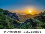 Sunrise over mountain peaks landscape. Beautiful sunrise in mountains. Mountain valley at dawn. Dawn sky in mountains