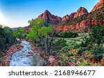A stream in the desert of the canyon. Red rock canyon river stream River stream in canyon. Canyon river stream landscape