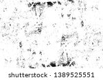 black and white distressed... | Shutterstock . vector #1389525551