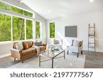 Small photo of interior living room with bright clean white walls airy green forest view and minimalist furnishings