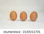 close up photo of chicken eggs | Shutterstock . vector #2133211731