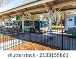 Small photo of GASTONIA, NC, USA-3 MARCH 2022: City bus terminal. Closeupshowing several buses lined up waiting for departure time.