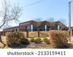 Small photo of GASTONIA, NC, USA-3 MARCH 2022: Salvation Army Administration and Social Service Center, building. Low, corner view from sidewalk.