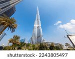Small photo of Dubai, United Arab Emirates - November 29 2022: The Burj Khalifa skyscraper, the tallest building in the world in the commercial downtown district of Dubai, United Arab Emirates.