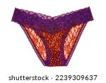 Underwear woman isolated. Close-up of luxurious elegant pink lacy thongs panties with colorful orange stars pattern isolated. Clipping path. Macro. Underwear fashion.