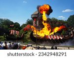 Small photo of Vikings show from Puy du fou where Vikings longship is set on fire