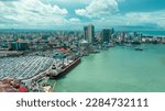 Small photo of Dar es Salaam, Tanzania - April 04: Container terminal and city landscape in port of Dar es Salaam on April 04, 2023 in Dar es Salaam, Tanzania.