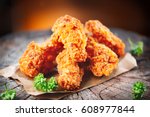 Fried Chicken Wings On Wooden...