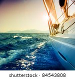 Yacht Sailing Against Sunset...