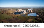 Small photo of DRAX POWER STATION, UK - JANUARY 16, 2023. An aerial view of Drax Power Station near Selby in North Yorkshire with the greenhouses that use excess heat for salad and food production