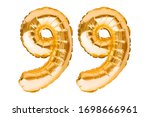 Number 99 ninety nine made of golden inflatable balloons isolated on white. Helium balloons, gold foil numbers. Party decoration, anniversary sign for holidays, celebration, birthday, carnival