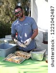 Small photo of San Diego, CA / USA - May 5 2018: Executive Chef Kevin Templeton of Barleymash making food.