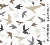 swallows in flight vector... | Shutterstock .eps vector #1169590144