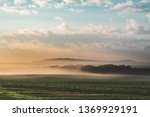 Foggy Early Morning Field landscape in the Countryside of France, Benney (Meurthe-et-Moselle) Beautiful Colored Sunset with Fog and Sea of Clouds Covering the Forest in Moody Atmosphere