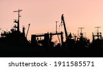 Silhouettes Of Ships And...