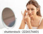 Small photo of Woman worried about face Dermatology, rosacea dermatitis, allergic steroids, sensitive skin, red face from sunburn, acne, dry skin,large pores ,rash face, dull, freckles, wrinkle, skin problem, beauty