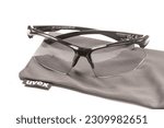 Small photo of Belgrade, Serbia - May 29. 2023.: UVEX SGL 802 VARIO black bicycle glasses isolated above white background with copy space.
