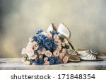Wedding shoes and bouquet