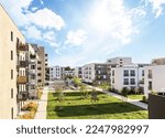 Cityscape of a residential area with modern apartment buildings, new green sustainable urban landscape in the city