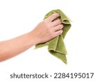 Hand holding green duster...