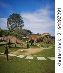 Small photo of PAHANG, MALAYSIA - MARCH 2ND 2022 : Dinasour Park at Kuantan Pahang give best experience fun for kids to learning about dinosaur.