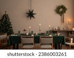 Interior design of christmas dinning room interior with table, christmas tree, chair, wreath, candle with candle stick, gifts, decoration, wooden consol and personal accessories. Family time Template.