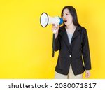 Gorgeous Asian businesswoman calling staff to announce news and alert rule info by loudspeaker and speak out order message to command direction and guide crew to force public sale advertisement