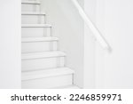 white staircase with steps up