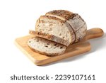 Sliced Sourdough Bread on wood board isolated on white background, homemade bakery concept