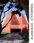 Small photo of Cascais/Portugal -November 24,2018:The Casa das Historias Paula Rego Museum designed by architect Eduardo Souto de Moura.Two pyramid-shaped towers and the red-coloured concrete museum.