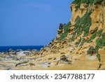 Small photo of The coast of Heping Island in Keelung City, Taiwan is subject to strong sea erosion, and the sea erosion terrain is developed, including mushroom stones, tofu rocks, and sea erosion platforms.