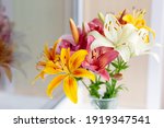 A Bouquet Of Lilies In A Vase...