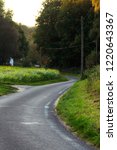 Small photo of Rural sidled road at countryside