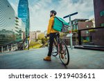 Small photo of Food delivery service, rider delivering food to clients with bicycle - Concepts about transportation, food delivery and technology
