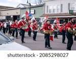 Small photo of Derry, New Hampshire, USA - November 27, 2021: Annual Nutfield Holiday Parade, Pinkerton Academy high school marching band