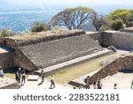 Small photo of Monte Alban, Oaxaca de Juarez, Mexico, 1st of January 2019, A aerial view on mayan pyramid of Monte Alban with tourists