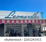 Small photo of Honolulu, HI, USA - Dec 30 2022: Signage at Leonard's Bakery in Honolulu, Hawaii. Leonard's is a local fixture famous for malasadas (Portuguese donuts), breads, pastries and other sweets