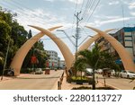 Small photo of Mombasa,Kenya Africa. 19.10.2019 Symbolic "Tusks" in city center Mombasa.The tusks were built to commemorate the visit of Queen Elizabeth to the town in 1952.