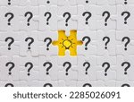 Small photo of innovation,Creative idea and thinking,New ideas,Education concept.,Light bulb icon on Missing White jigsaw or puzzle among question mark icon over yellow background.