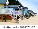 Colourful Wooden Beach Huts On...