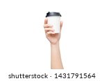 Take away coffee cup background. Female hand holding a coffee paper cup isolated on white background with clipping path. Close-up image.
