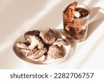 Small photo of Dried shiitake mushrooms.Dried shiitake mushroom soaked in water overnight.This "dashi(water)" use to popular Japanese food "Mentsuyu(for Somen noodles soup)"and Japanese stews.Donko.
