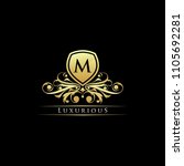 golden luxury m letter design... | Shutterstock .eps vector #1105692281