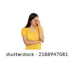 Small photo of young brunette woman over white isolated background with headache or nose pain. concept of problem and difficult task, business. predicament fear and confusion