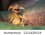 Small photo of London, UK - October 2018: Madame Tussaud’s Waxwork Museum, Realistic lifelike model of Salacious Crumb from Star Wars Return of the Jedi
