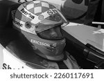 Small photo of Nazareth, PA, USA - April 8, 2000: A grainy, old-school black-and-white photo of race driver Kenny Brack preparing to compete in the 2000 Bosch Spark Plug GP at Nazareth Speedway.