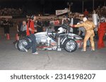 Small photo of Anderson, IN, USA - May 26, 2012: Race driver Chet Fillip makes a pit stop during the Little 500 Sprint Car race at Anderson Speedway in Indiana.